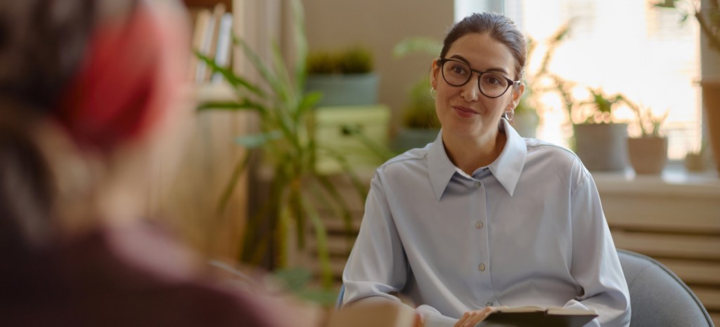 female counselor engaging with client
