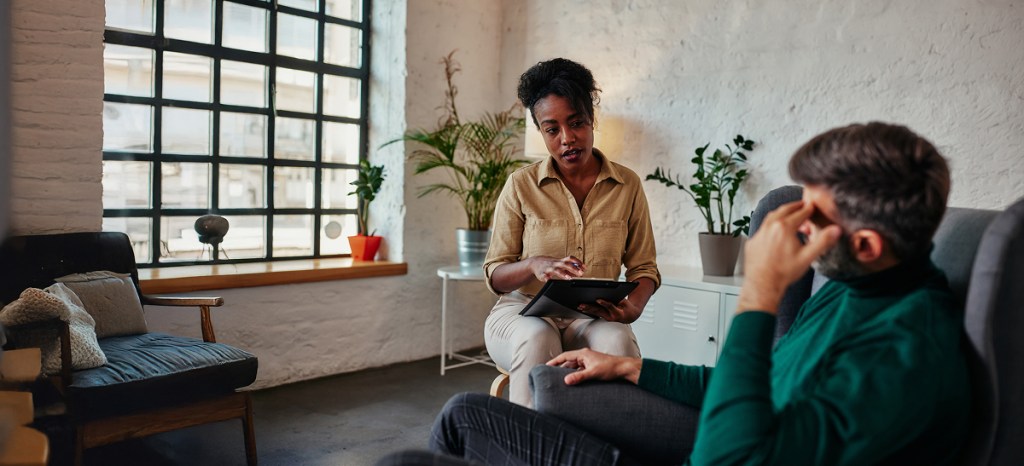 counselor in sessions with a client with depression